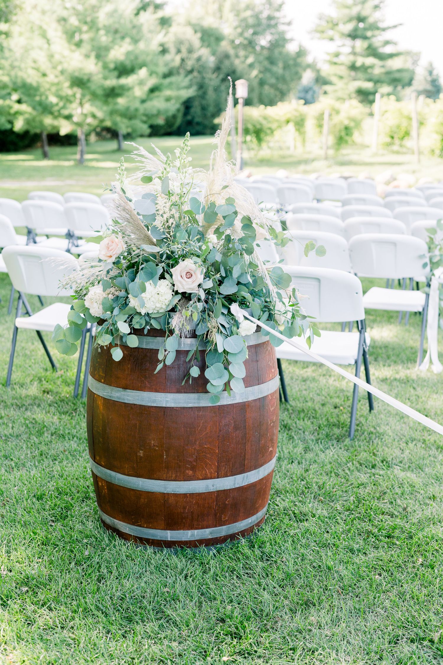 Vineyard photos with white willow events at Prairie Moon Winery wedding in Ames, Iowa