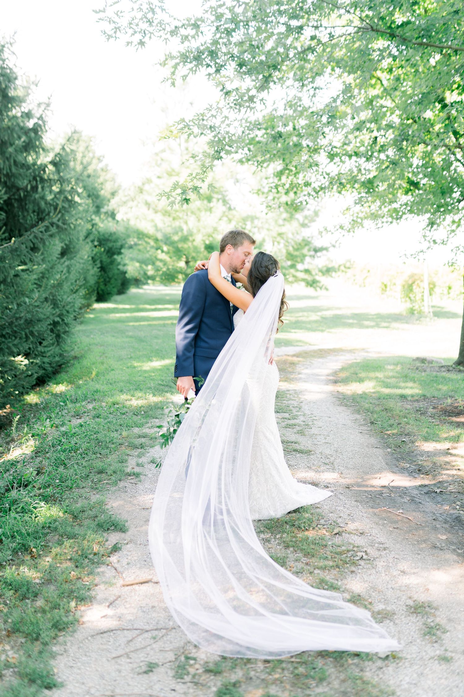 Vineyard photos with white willow events at Prairie Moon Winery wedding in Ames, Iowa