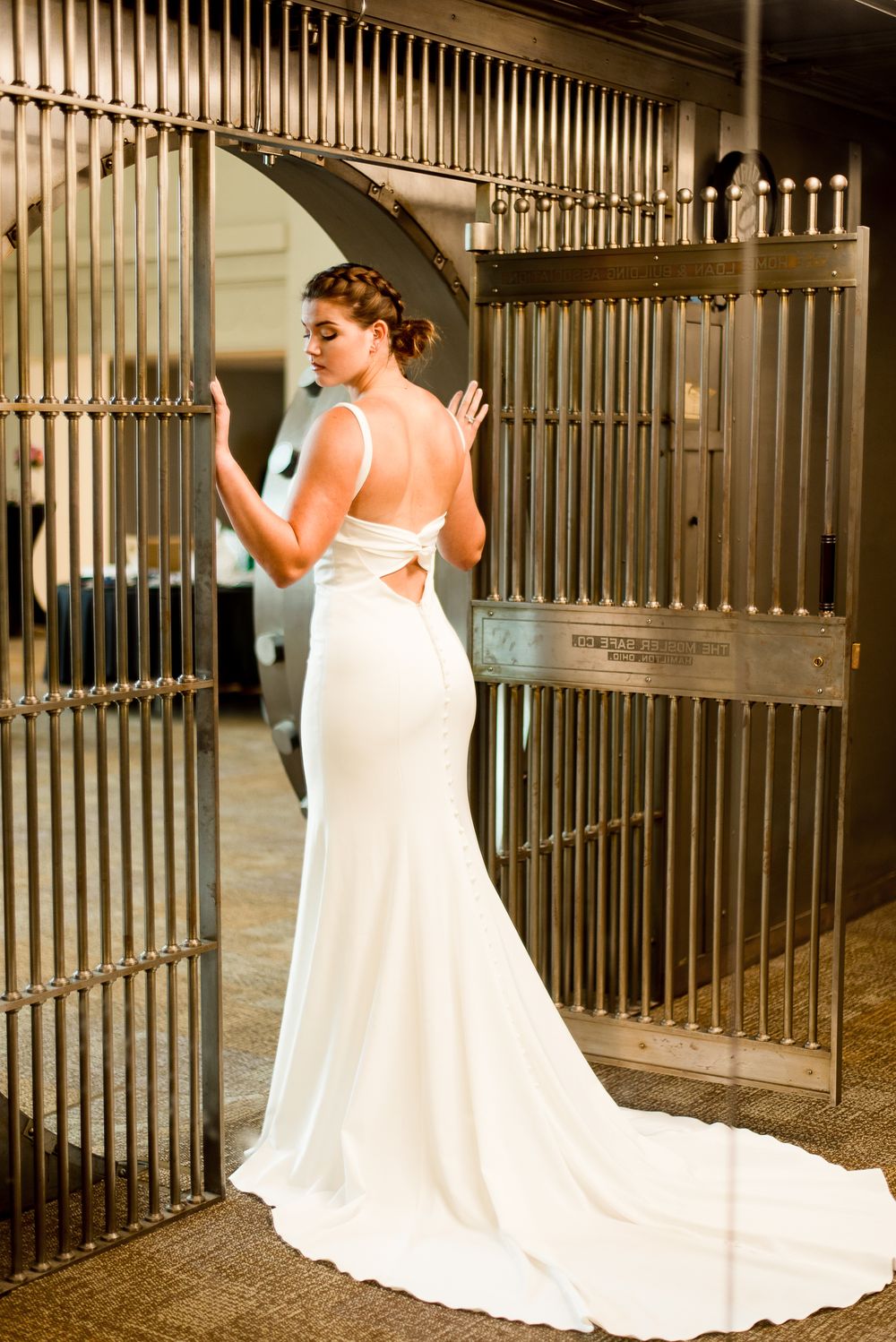 bride standing in vault, wedding dress, shot from behind, Benison, Cincinnati OH