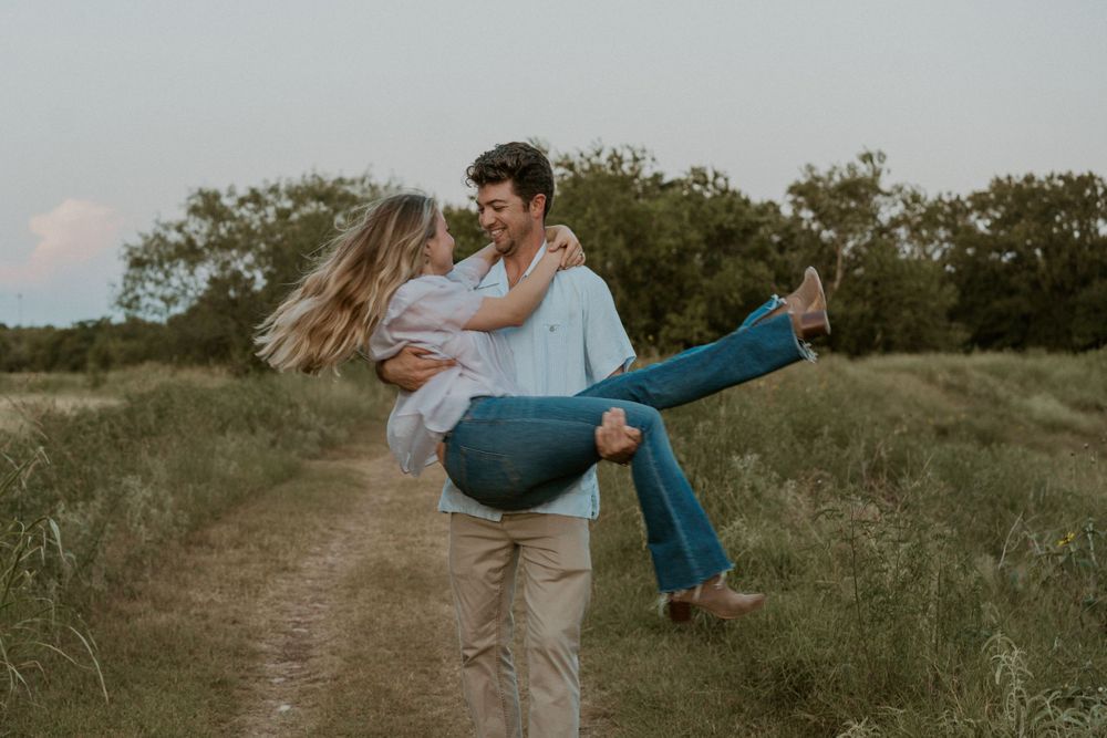 Couple dancing on a dirt road