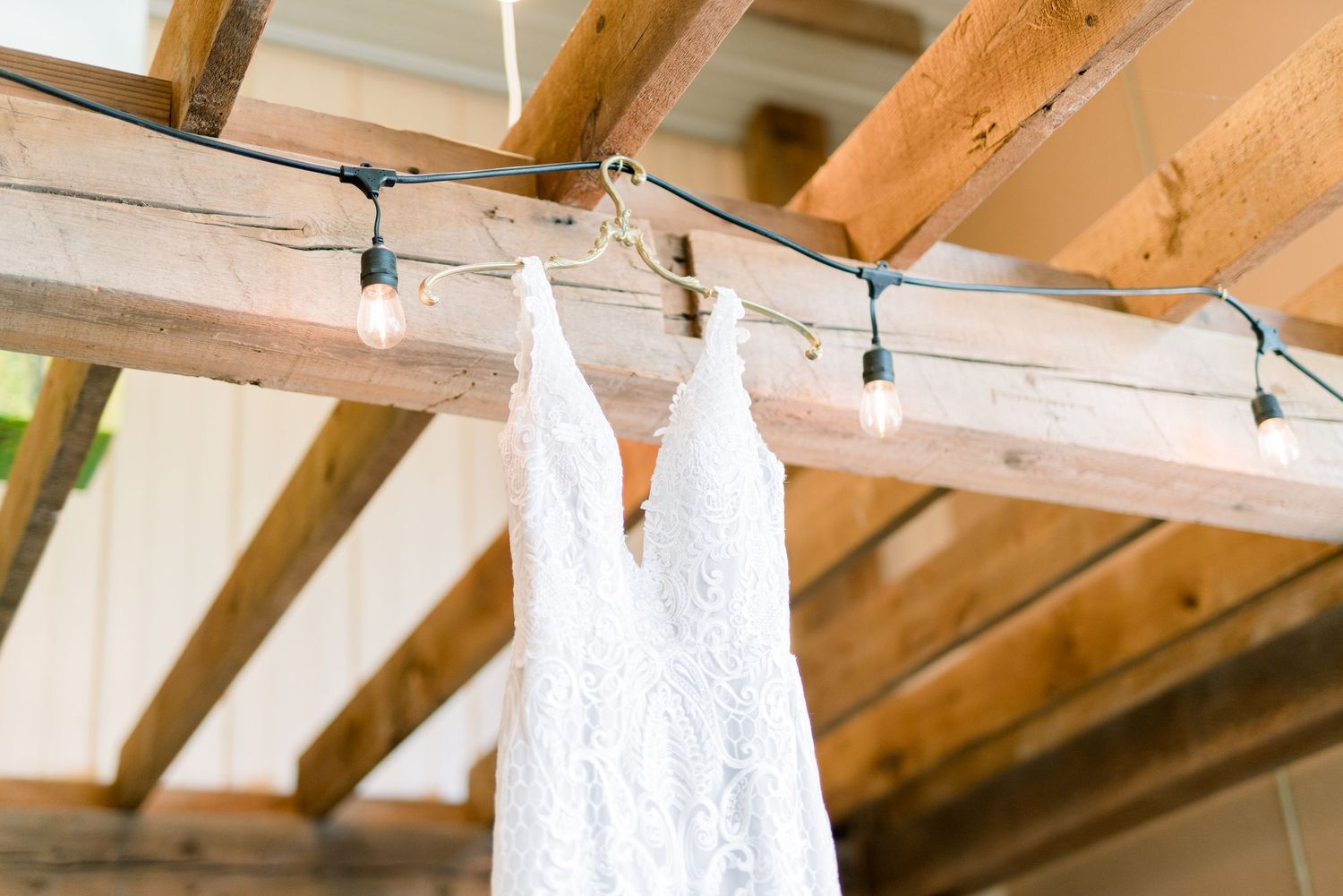 Ames, Iowa Vineyard Winery Wedding at Prairie Moon Winery with light and airy photography and White willow florals