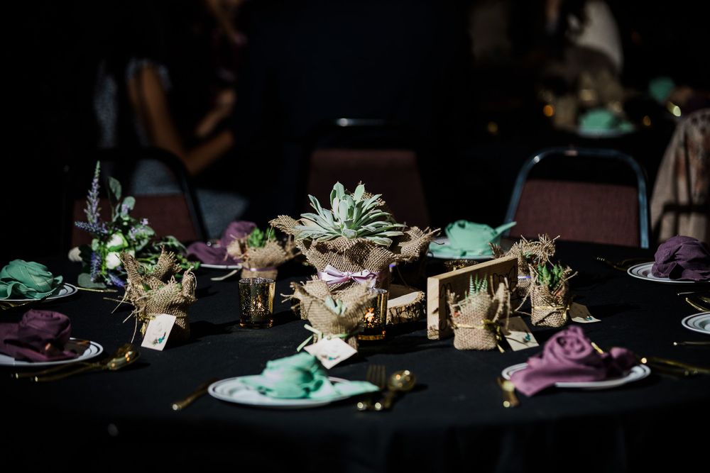 Wedding table setting of succulents with purple and green accents by Hudson Valley photographer