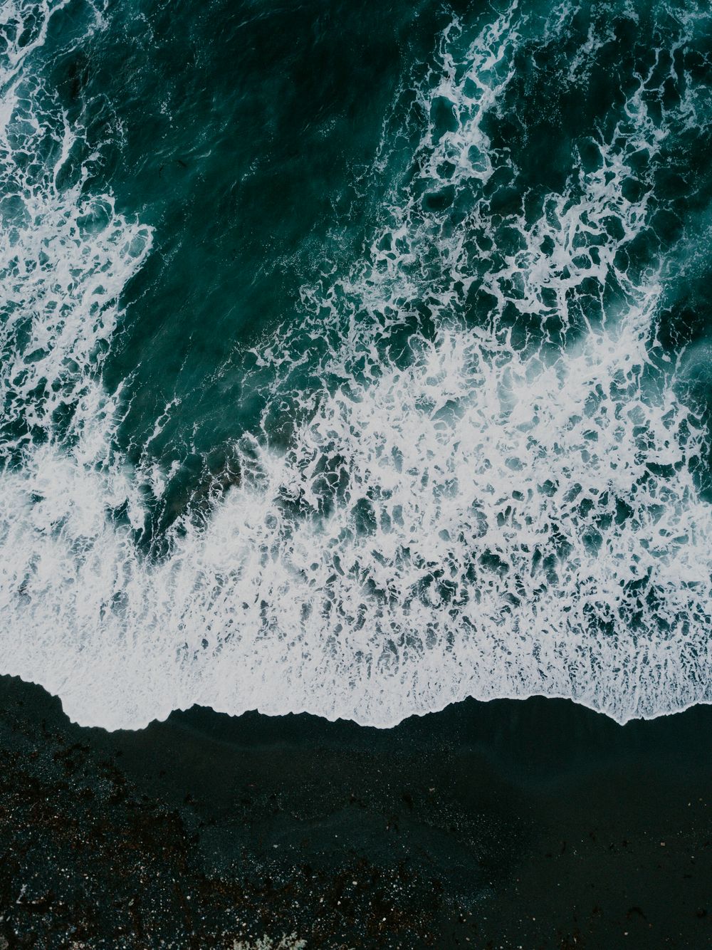 Aerial photo of black sand beaches blue water and sea foam Moruya Heads Sarah Matler Photography Moody Landscape South E