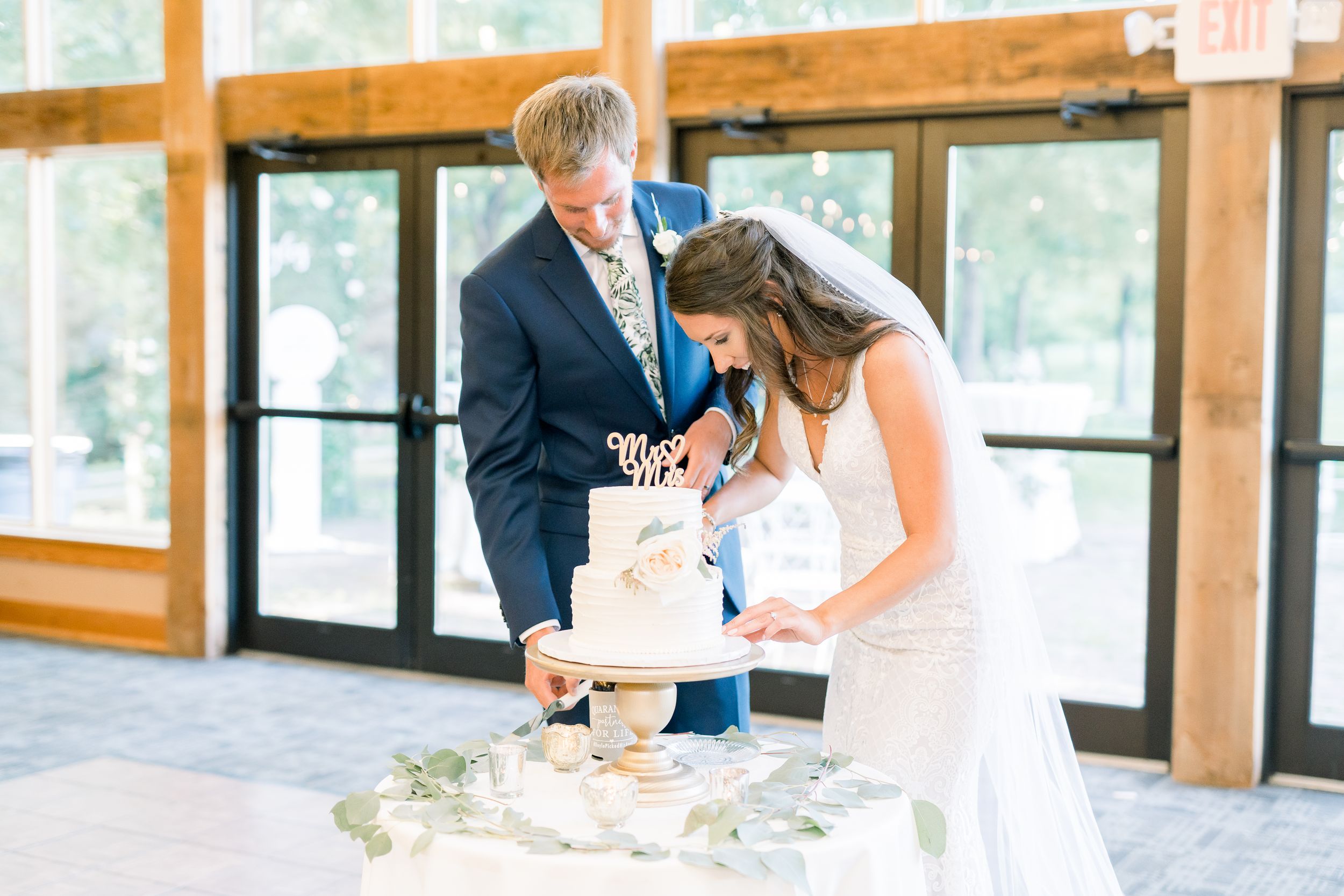 Vineyard photos with white willow events at Prairie Moon Winery wedding in Ames, Iowa