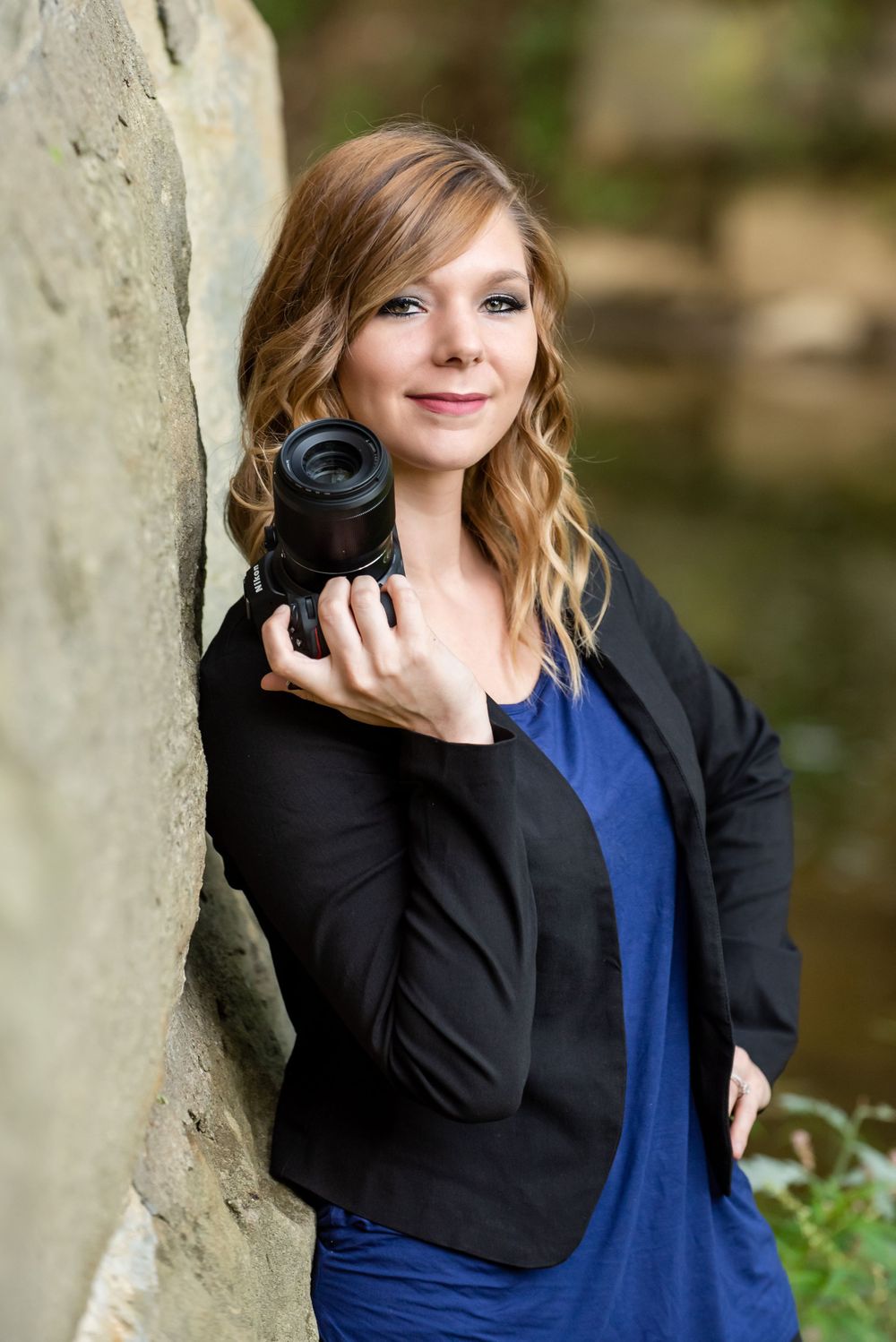 Portraits by Athena, business picture with her camera