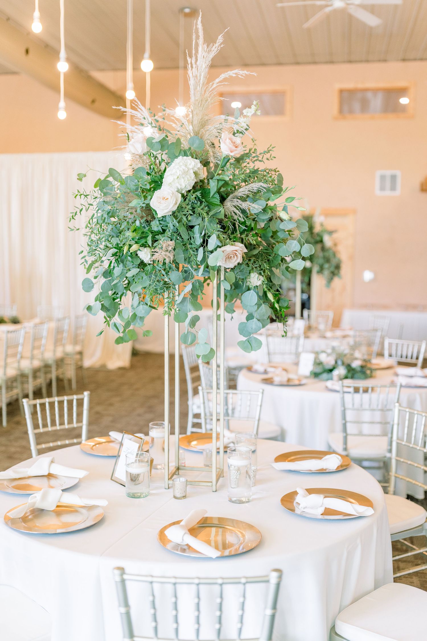 Vineyard photos with white willow events at Prairie Moon Winery wedding in Ames, Iowa