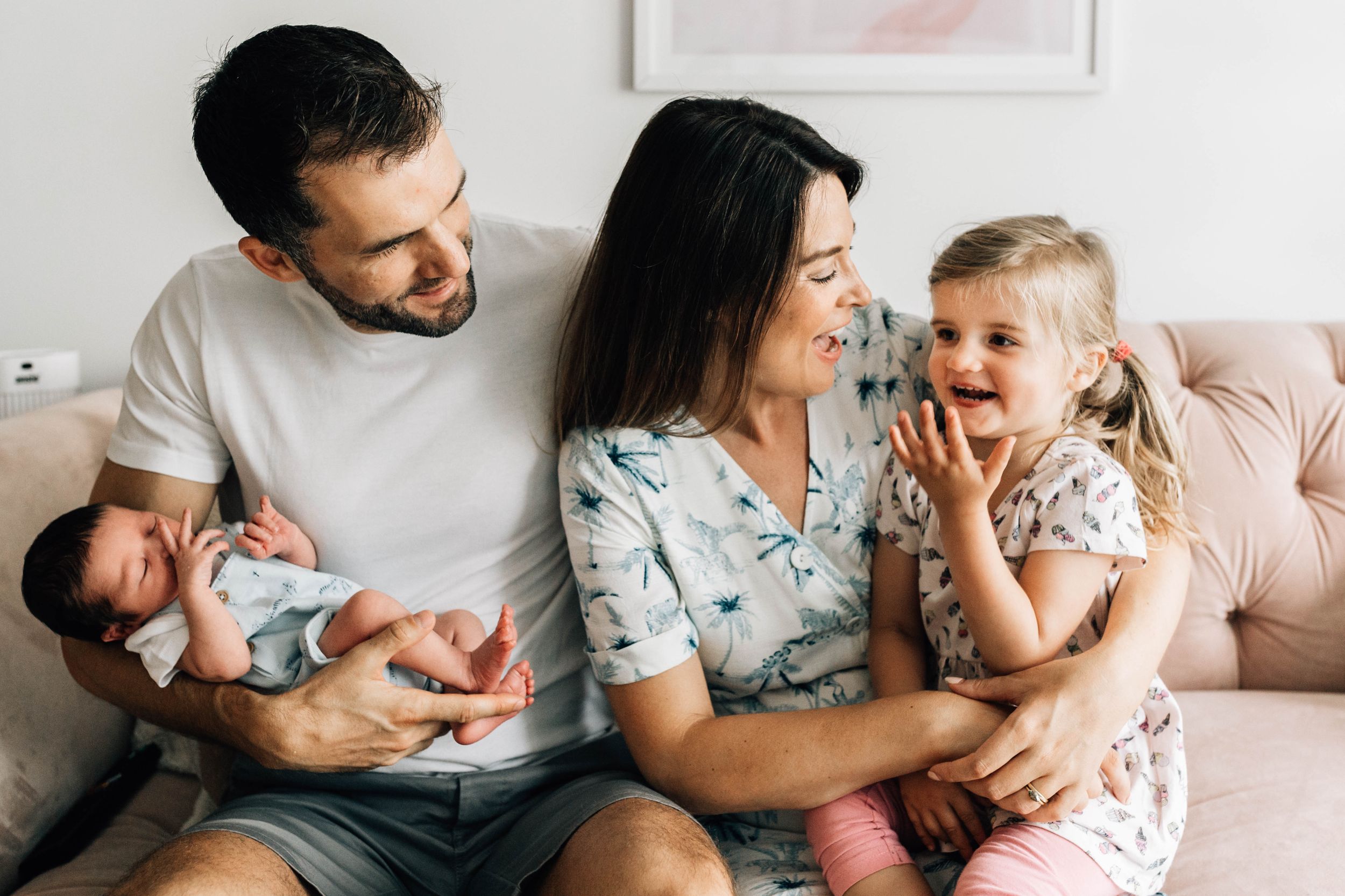 family of four toddler girl newborn baby boy