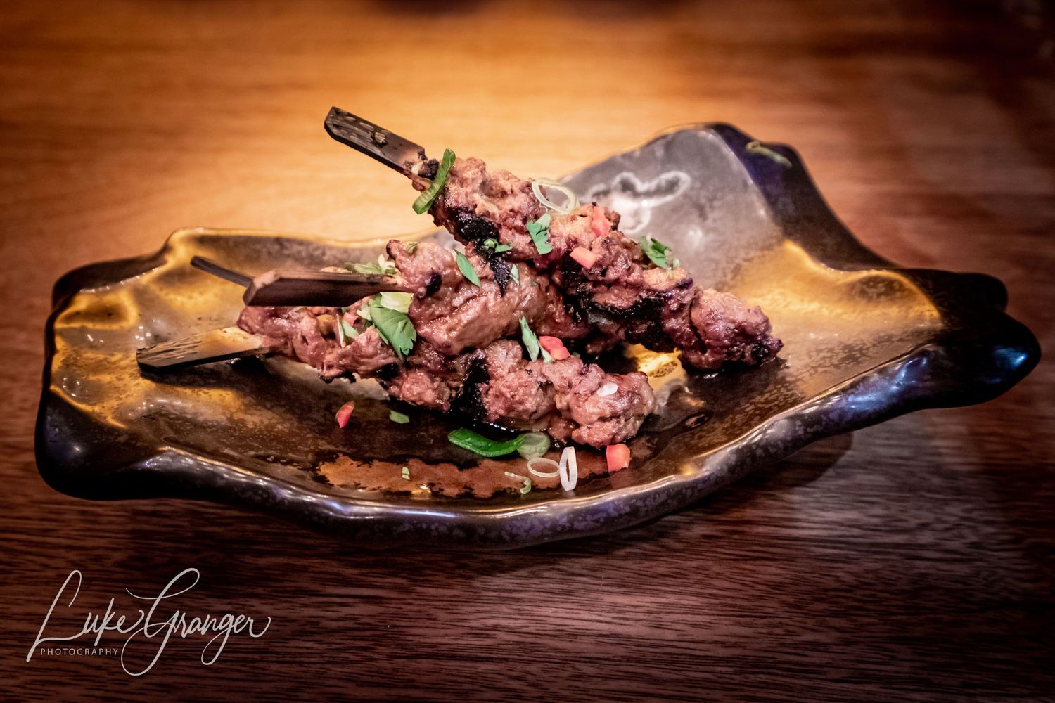 korean beef skewers at the fire pit restaurant at the cave hotel