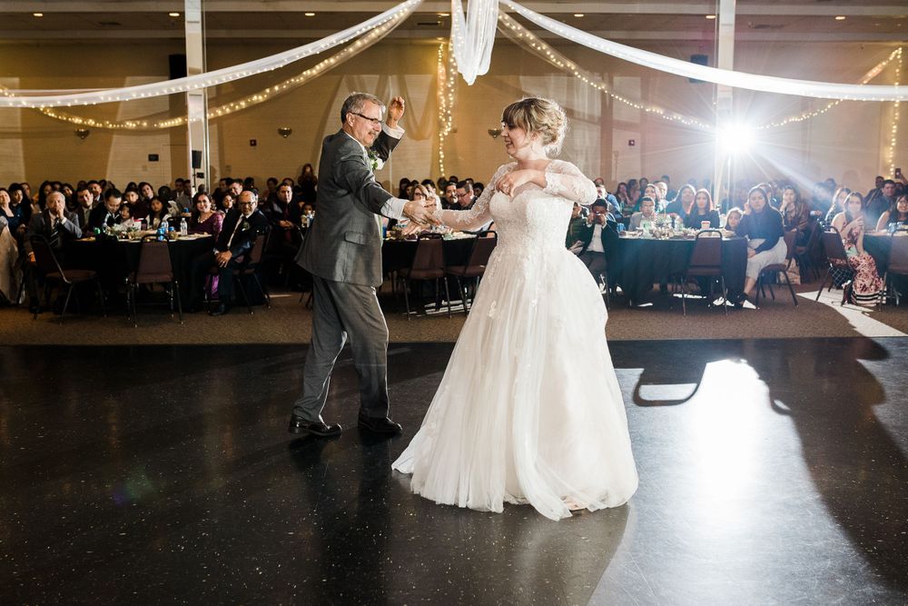 Bride and her father swing dance at wedding reception by Hudson Valley photographer