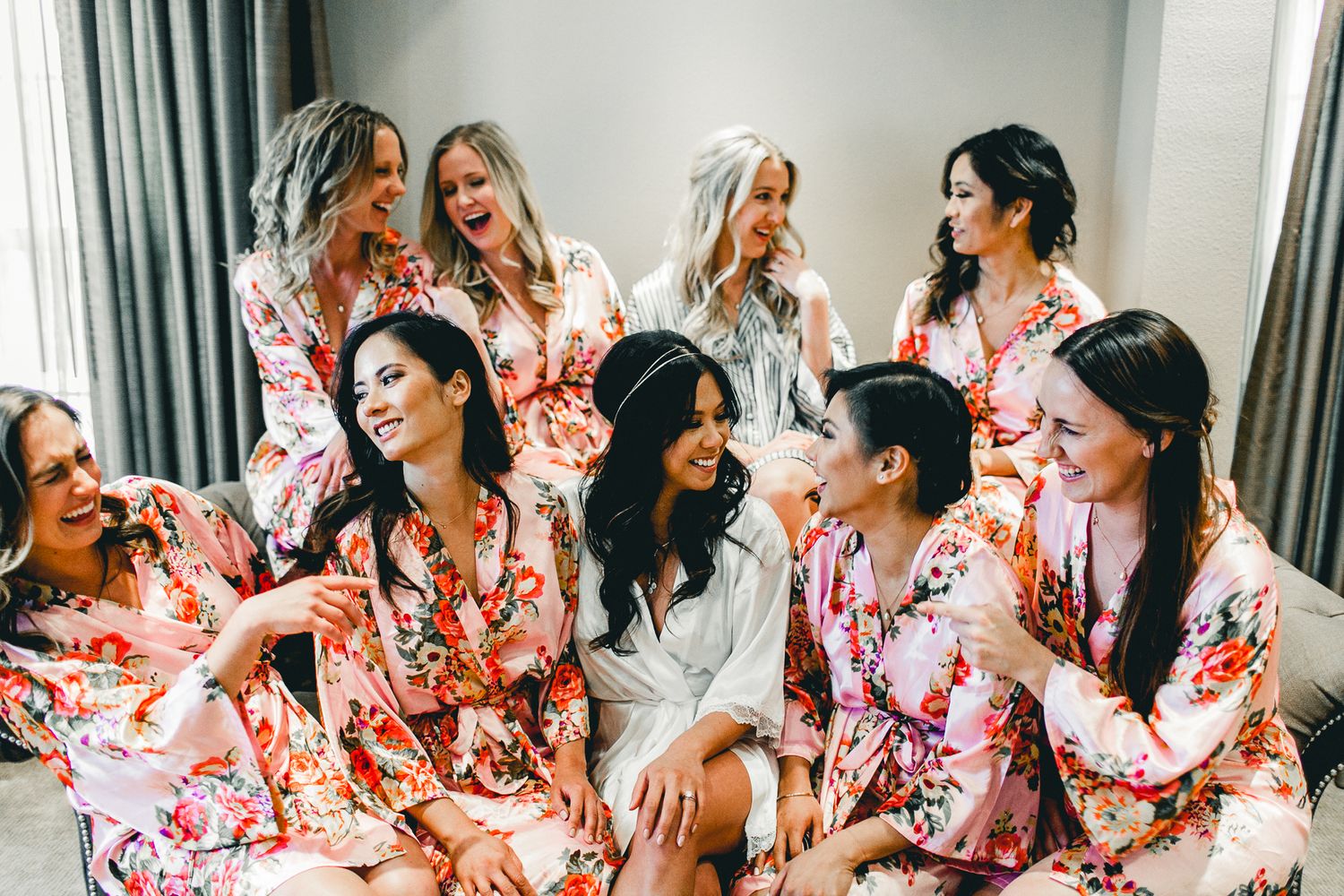 candid photo of bridal party and bride in robes
