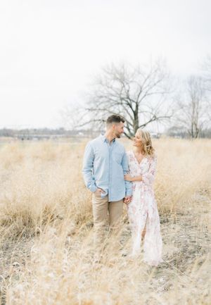 Light and airy film lakeside dock engagement session at Gray's Lake in Des Moines, Iowa