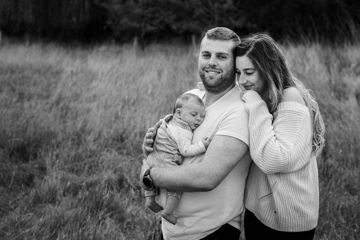 In a field in Havant, Hampshire a New Mum and Dad lovingly cradle their Newborn Son.
