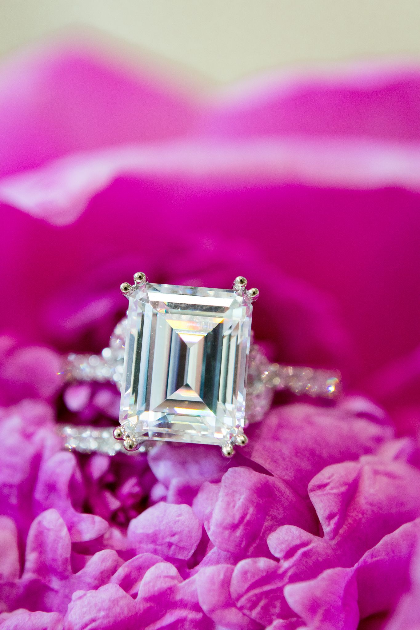 emerald cut wedding ring inside pink flower, detail shot, Benison, Cincinnati OH