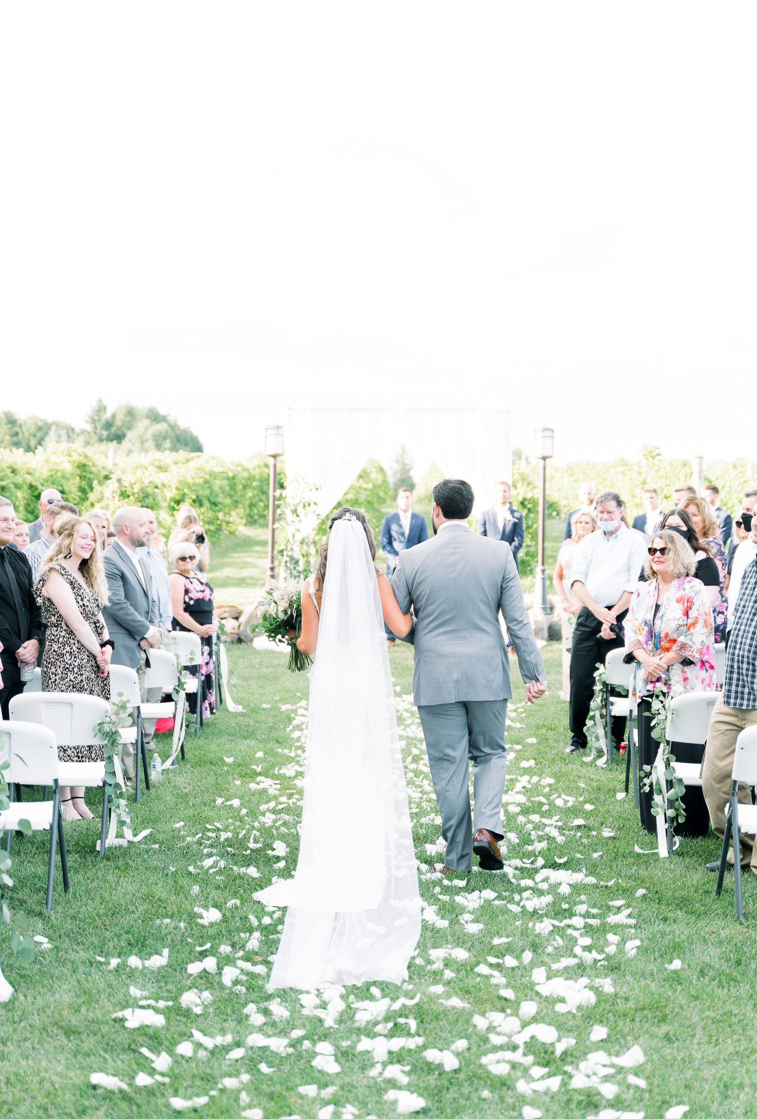 Vineyard photos with white willow events at Prairie Moon Winery wedding in Ames, Iowa