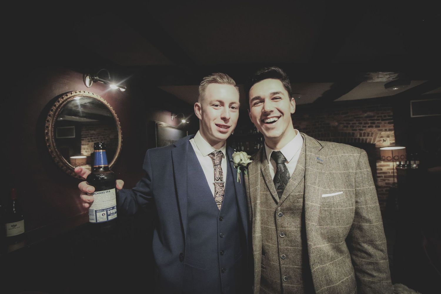 Wedding guests enjoying a drink at Hotel Du Vin in Poole