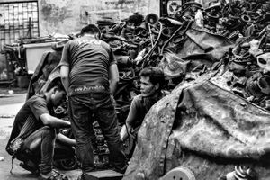 Scrap metal workers n China town Bangkok Thailand