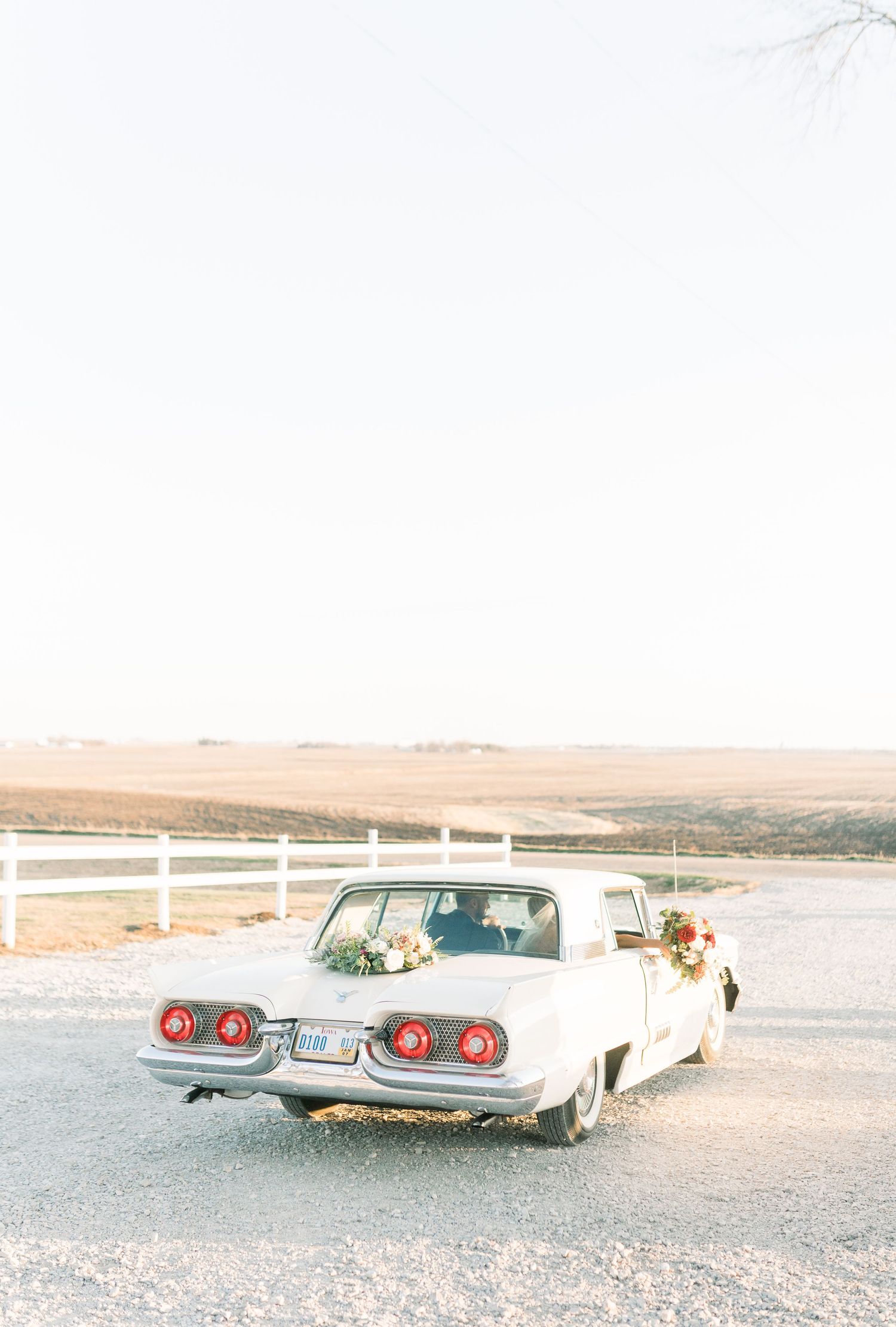 winter wedding at 1868 Farmhouse Wedding in Boone, Iowa with Modern Dress bridal gown