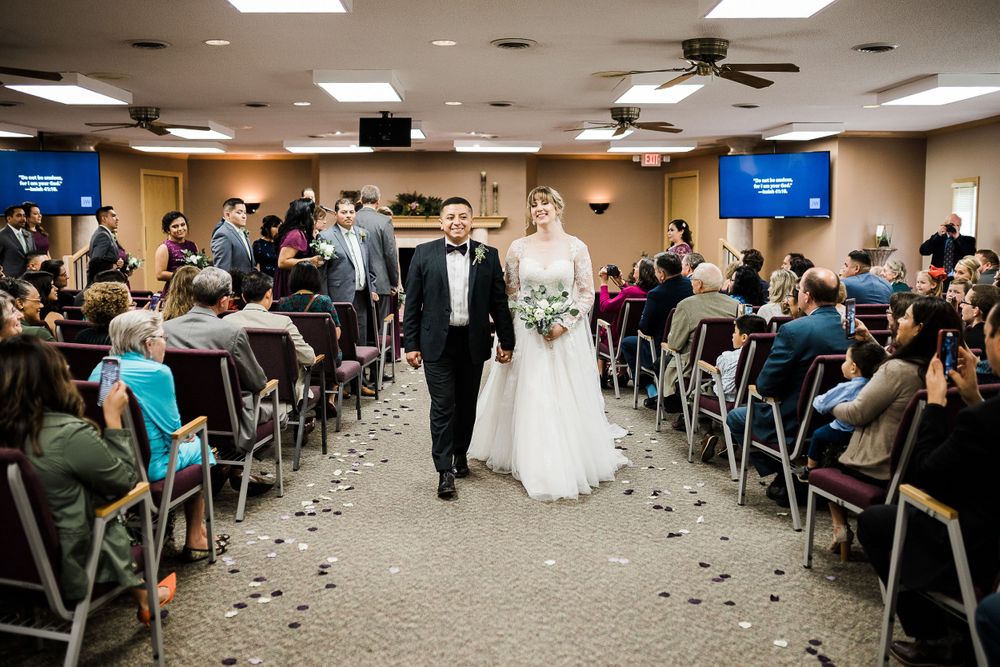 Bride and groom walk back down the aisle as man and wife by Hudson Valley photographer