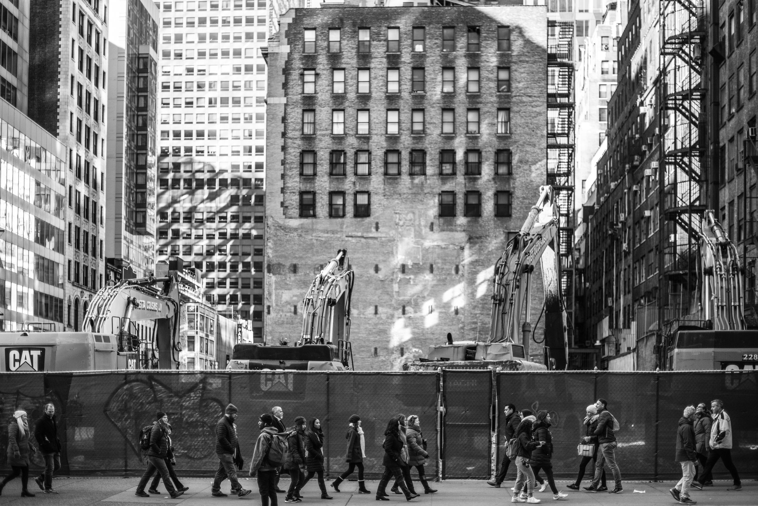 NYC: people walking along Fifth Ave before noon