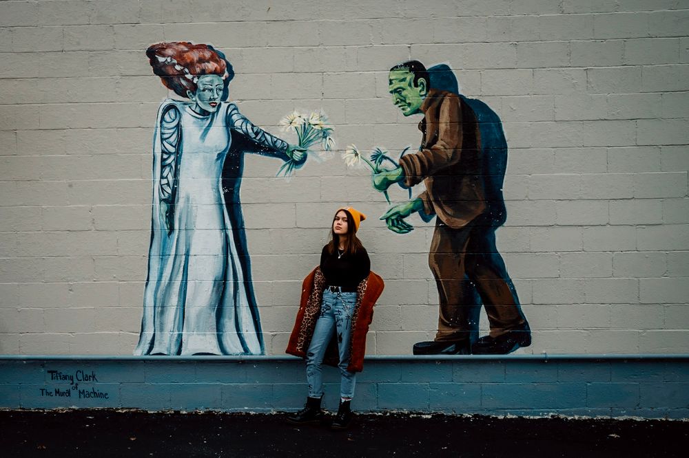 urban teenager by Frankenstein mural in Fairborn l portrait photography cincinnati ohio senior photographer dayton