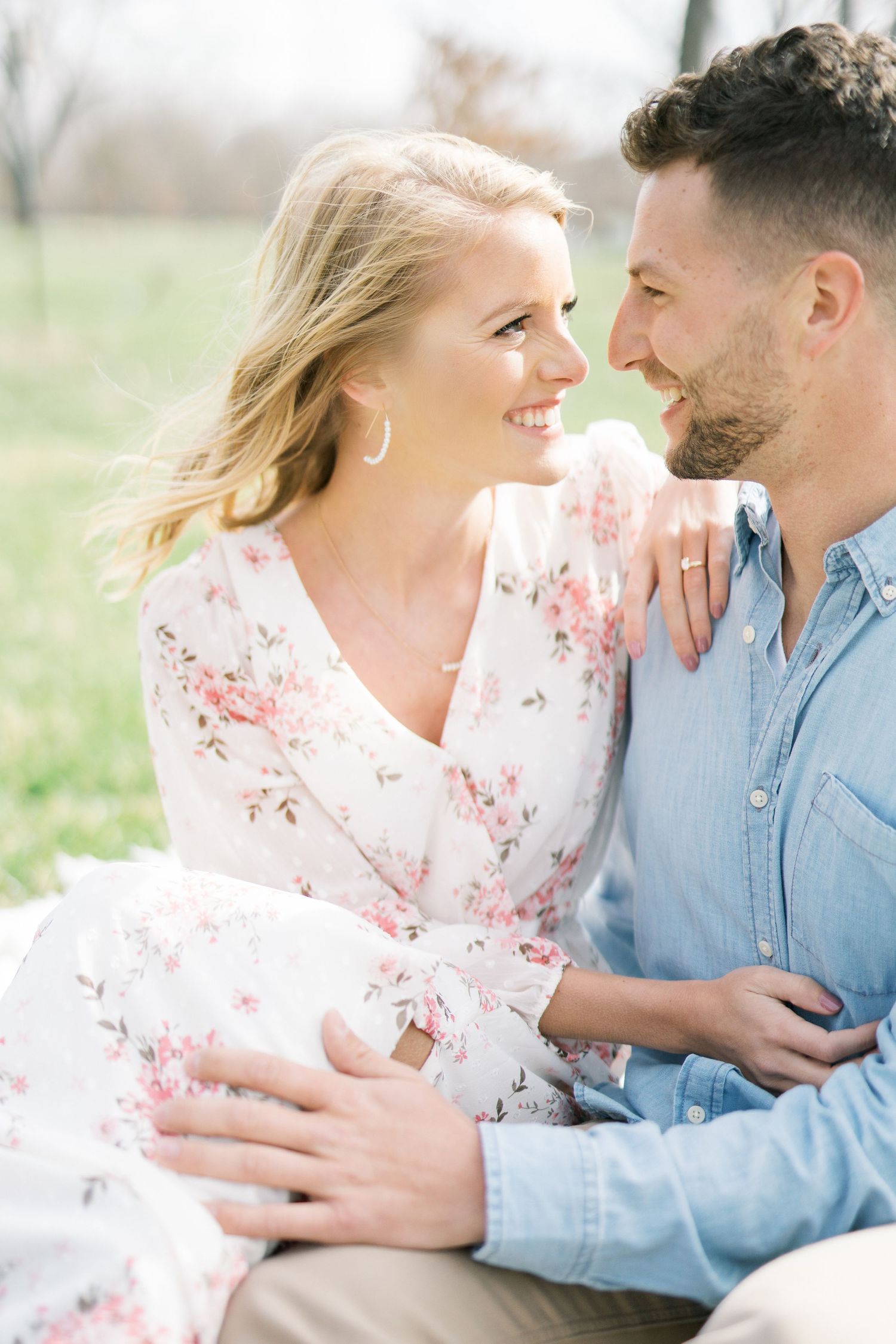 Light and airy film lakeside dock engagement session at Gray's Lake in Des Moines, Iowa