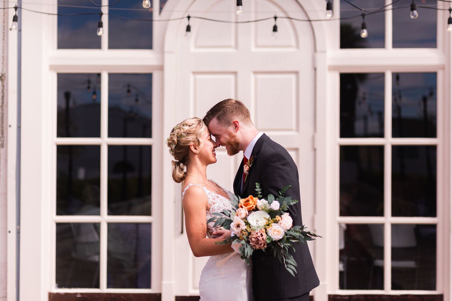 local bride and groom enjoy their first intimate moments as wife and husband at barn at winthrop. photo by tampa weddin
