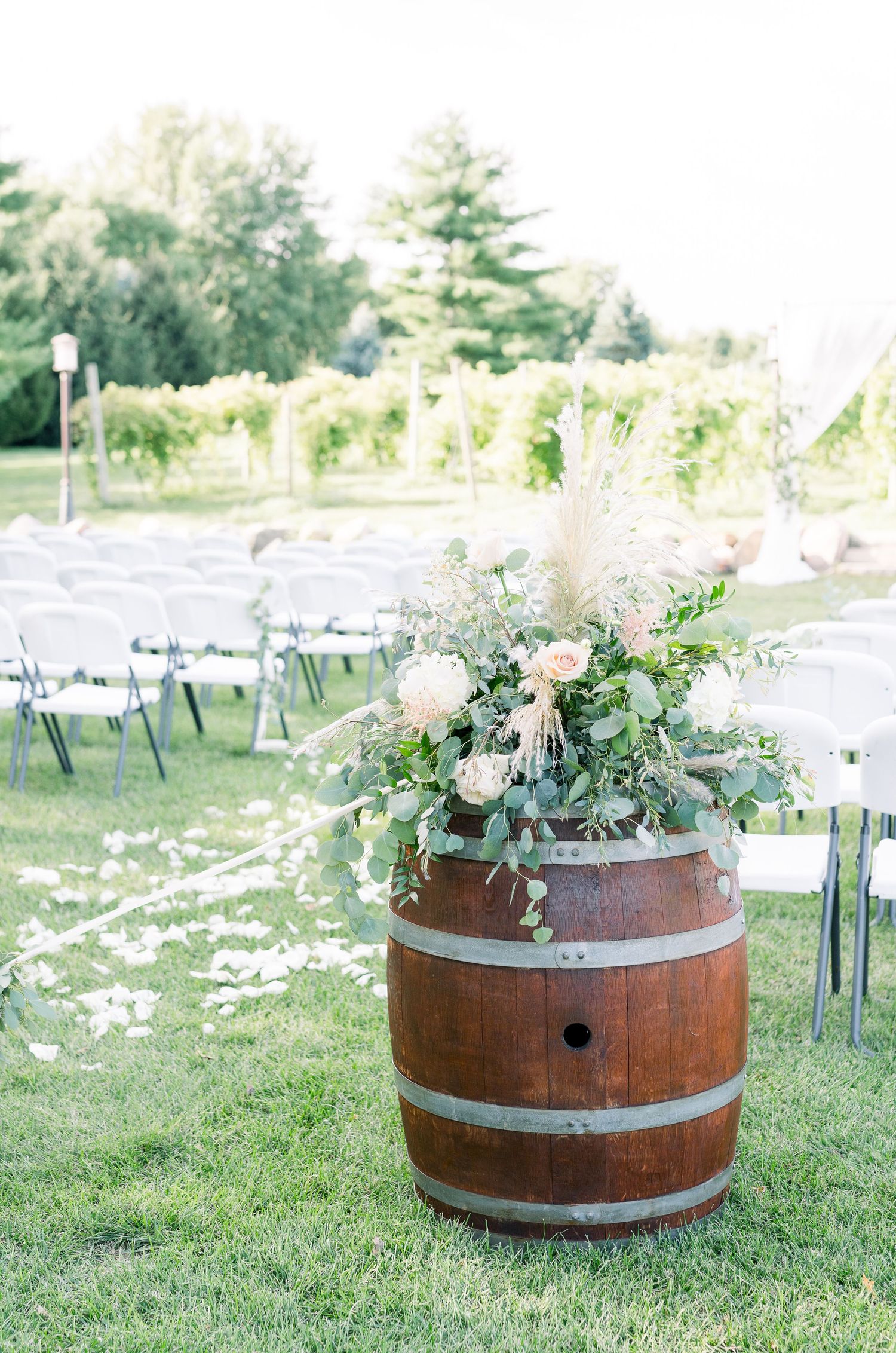 Vineyard photos with white willow events at Prairie Moon Winery wedding in Ames, Iowa