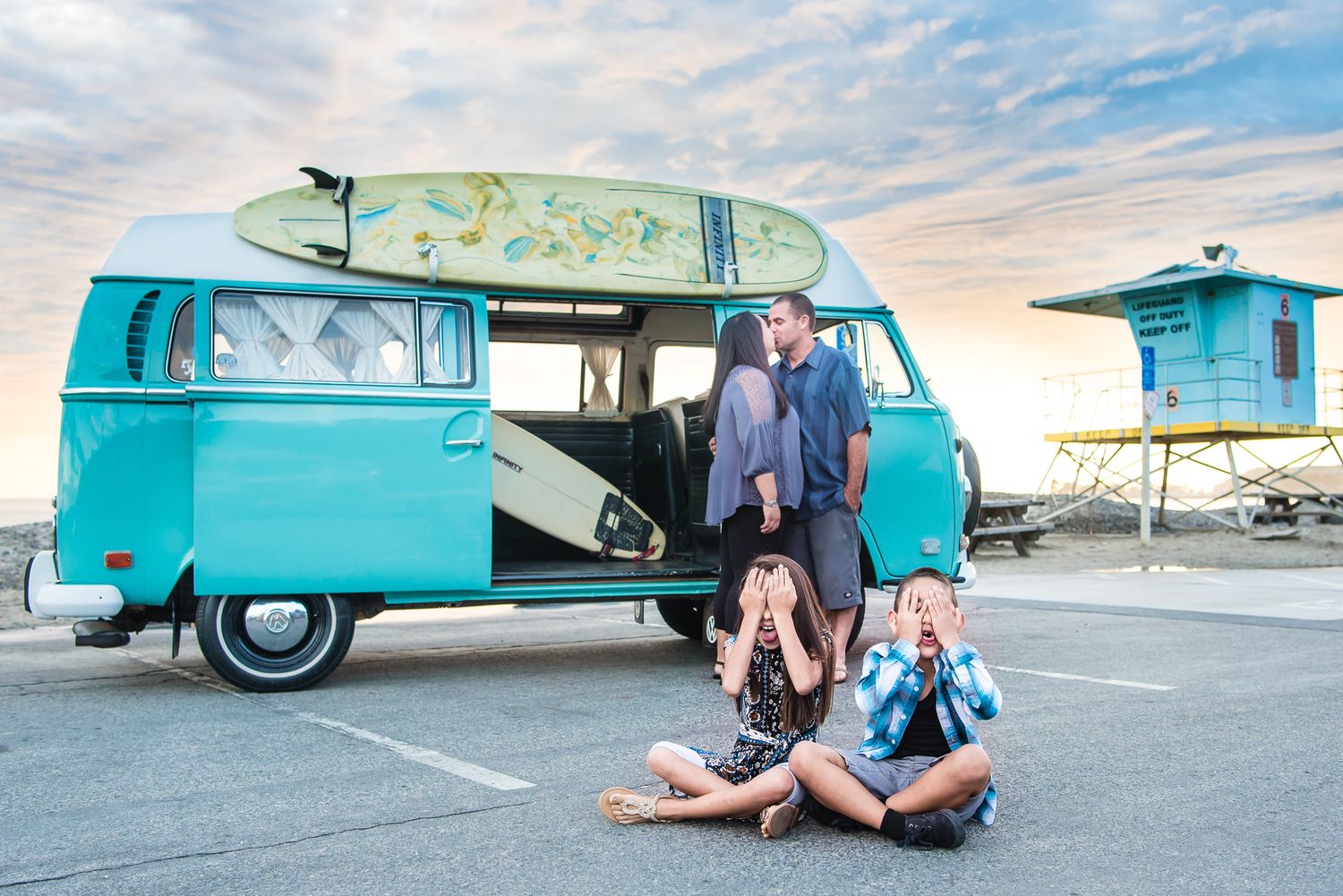 Image of an Orange County Family at the beach in Dana Point, CA with a classic VW Bus