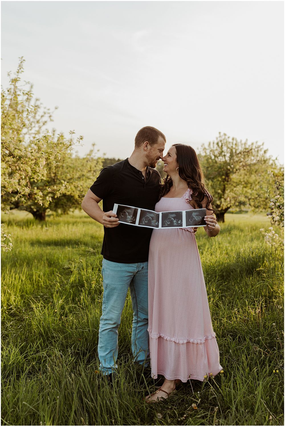 NH couple taking pregnancy announcement photos