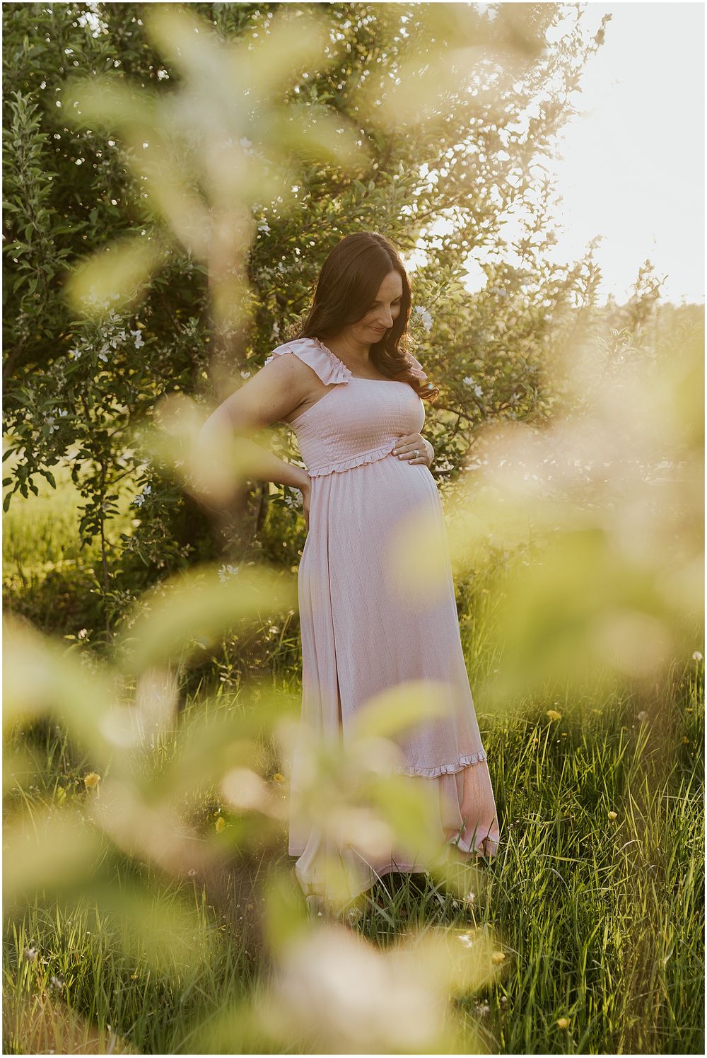 NH woman taking maternity photos