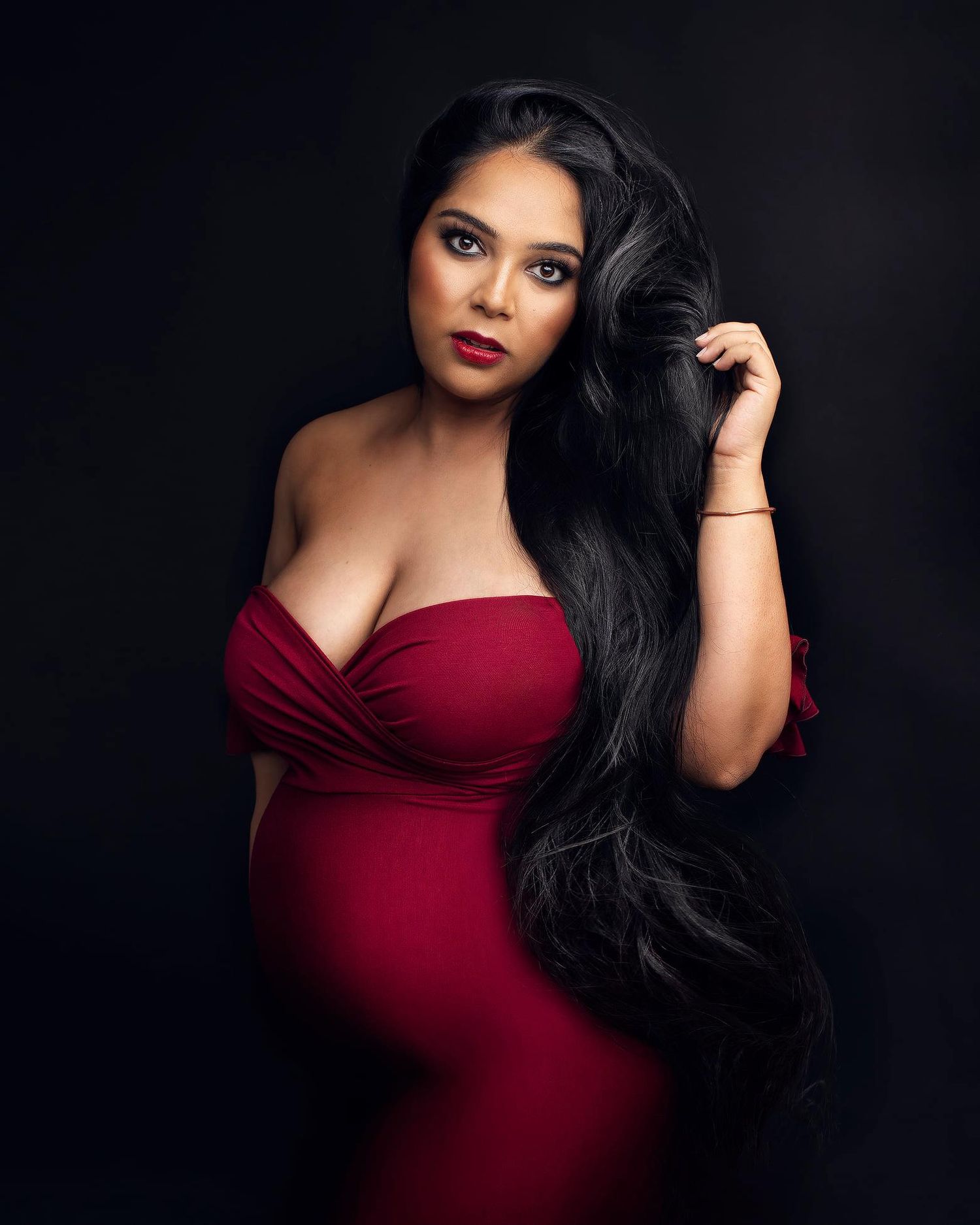 pregnant mom in a red dress Maternity photos Surrey Vancouver Elizabeth Lang Photography