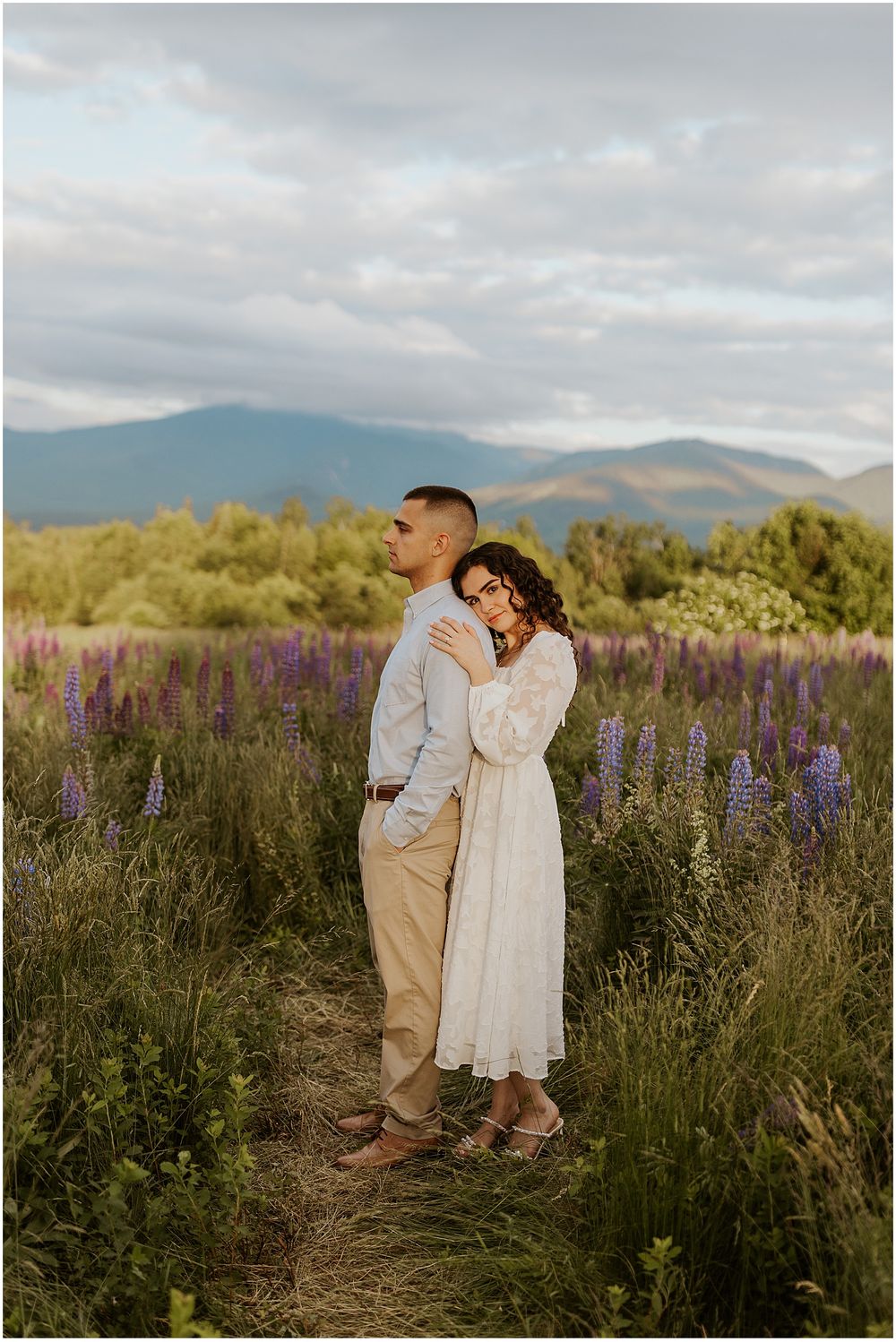 A NH couple during their lupine flower photo session