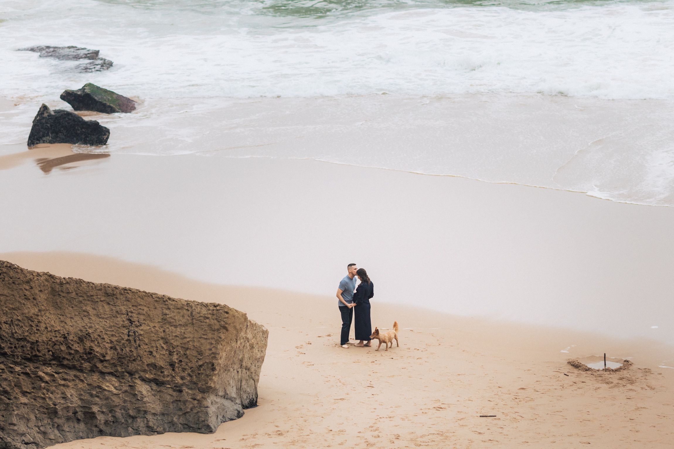 Natural and intimate pregnancy session at azenhas do Mar, portugal, capturing the beauty of a couple expecting their first child