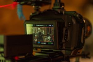 Close-up of camera LCD screen displaying video recording in progress.