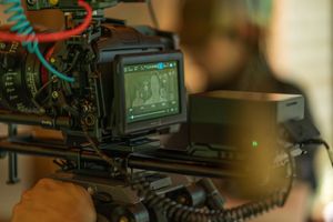 Professional camera equipment showing monitor display during film production setup.