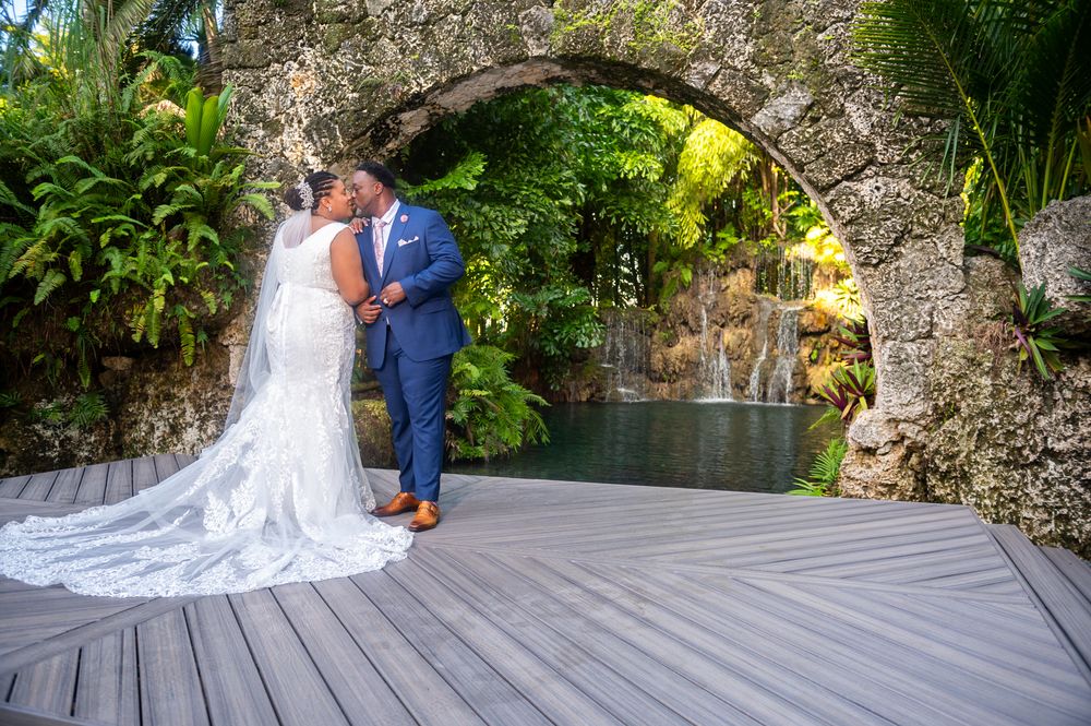 Jay waits for his bride in a tropical oasis, photographed by Florida destination wedding photographers.