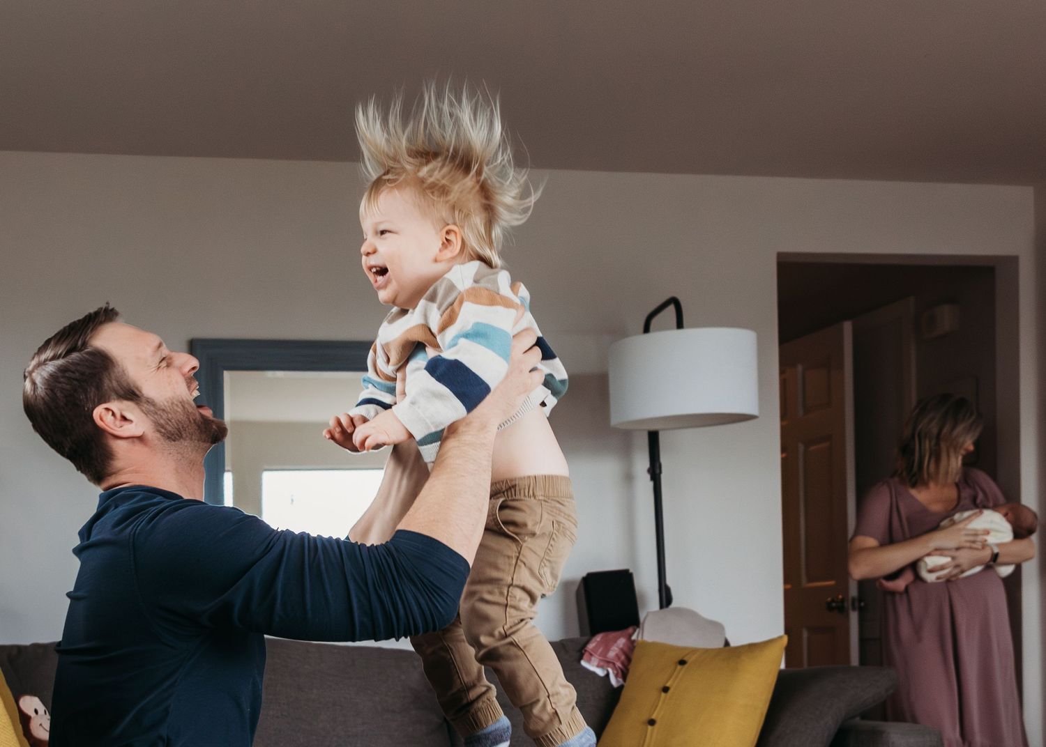 A series of candid lifestyle photographs showing playful parent-child moments in different interior settings.