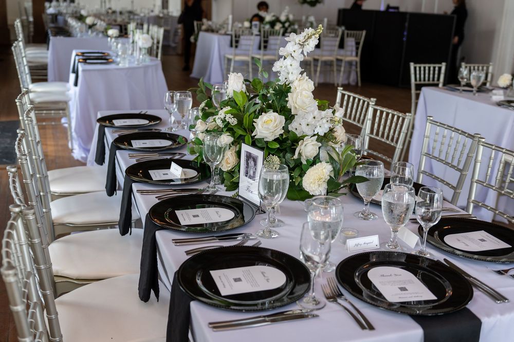 Elegant wedding reception florals by FauxReal Flowers, captured by South Florida wedding photographers