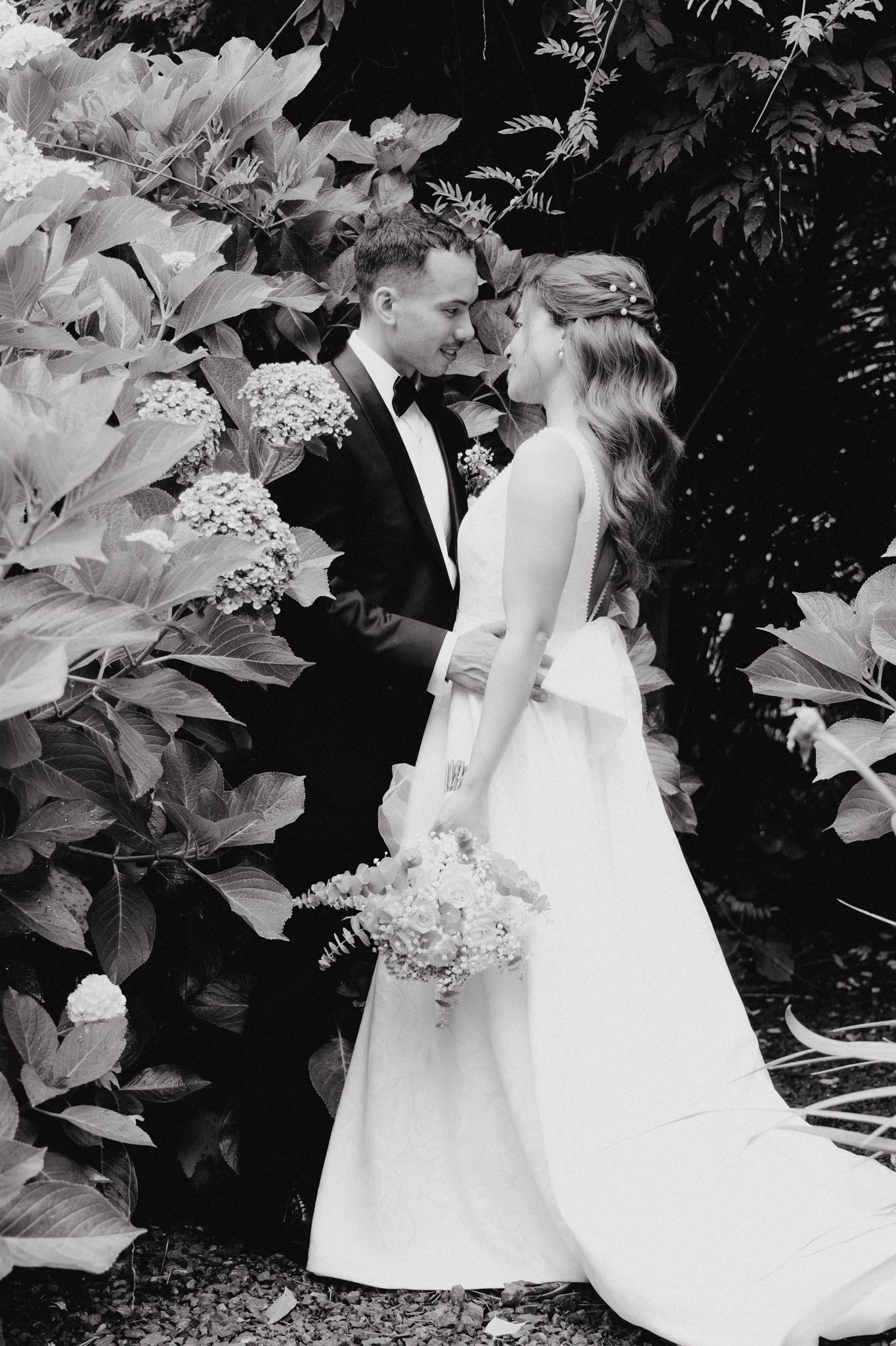 Black and white romantic wedding photograph captured by Apertured Media Auckland Wedding Photographer.