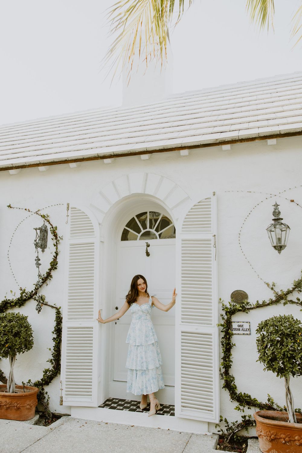Senior graduation photos on Palm Beach Island off of Major Alley captured by Lindsay McDow Photography