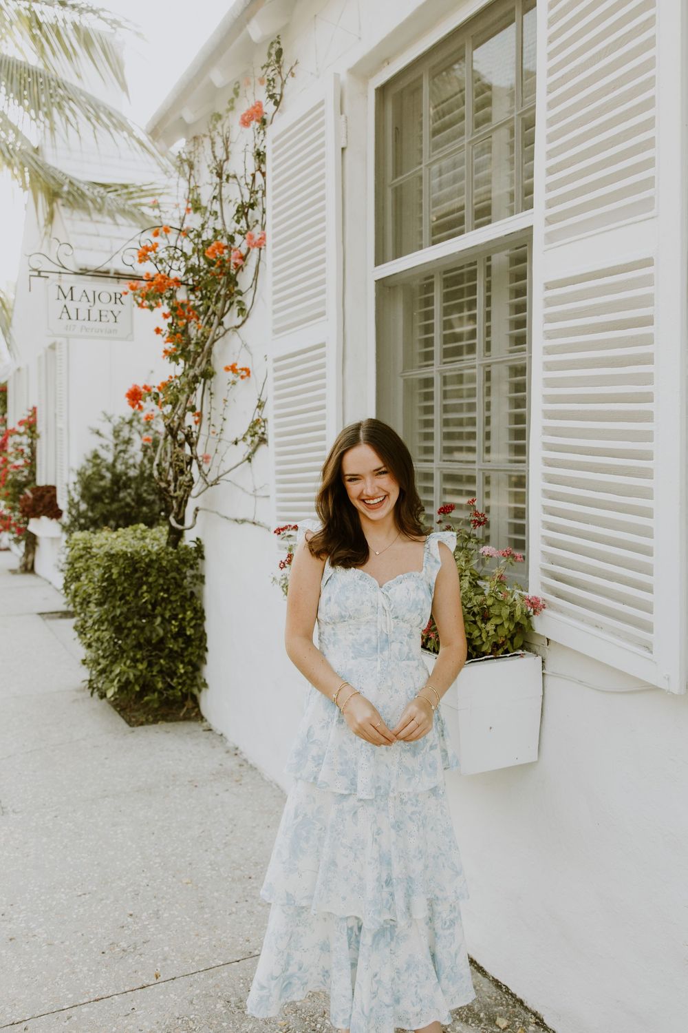 Senior graduation photos on Palm Beach Island off of Major Alley captured by Lindsay McDow Photography