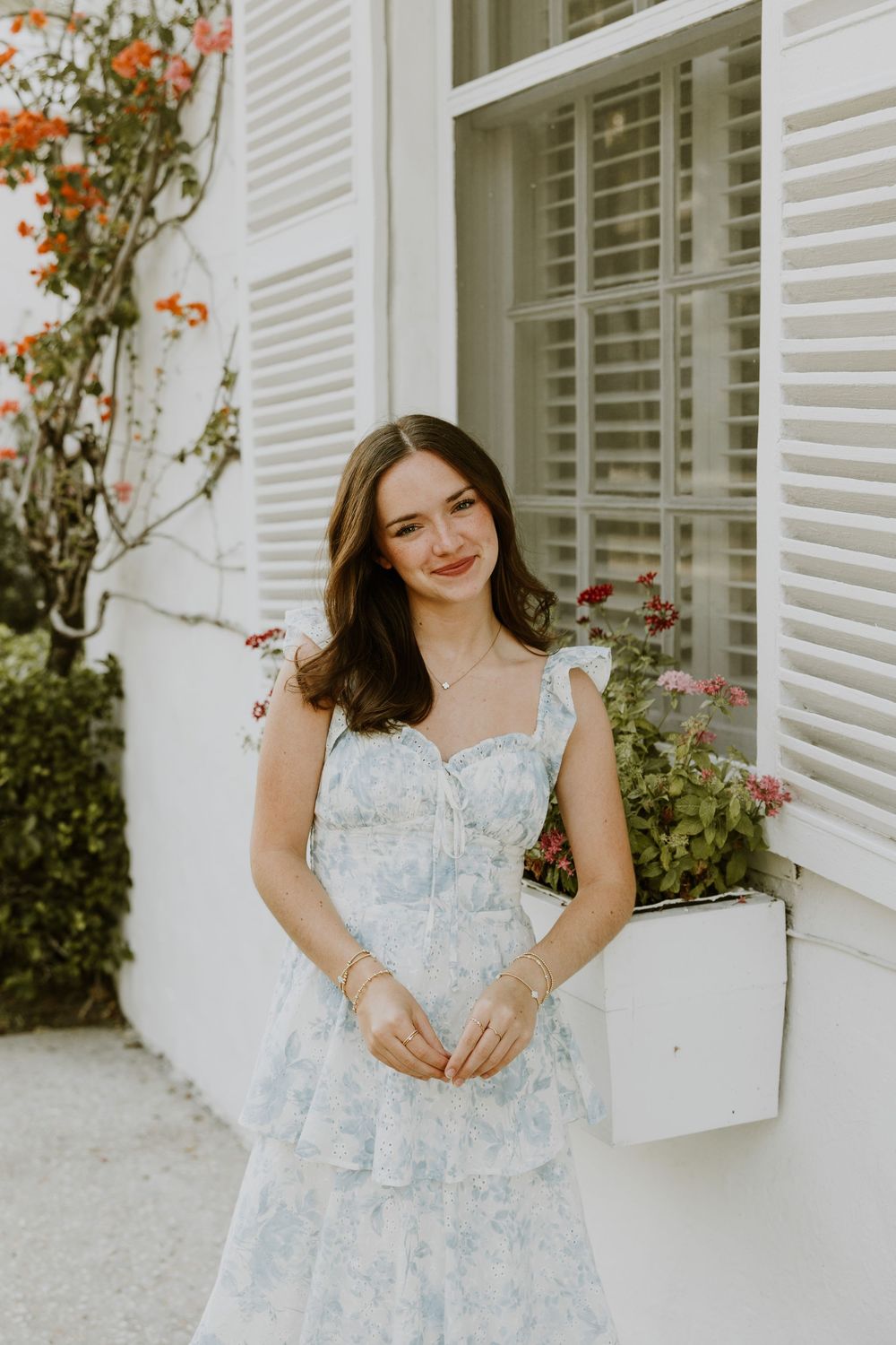 Senior graduation photos on Palm Beach Island off of Major Alley captured by Lindsay McDow Photography
