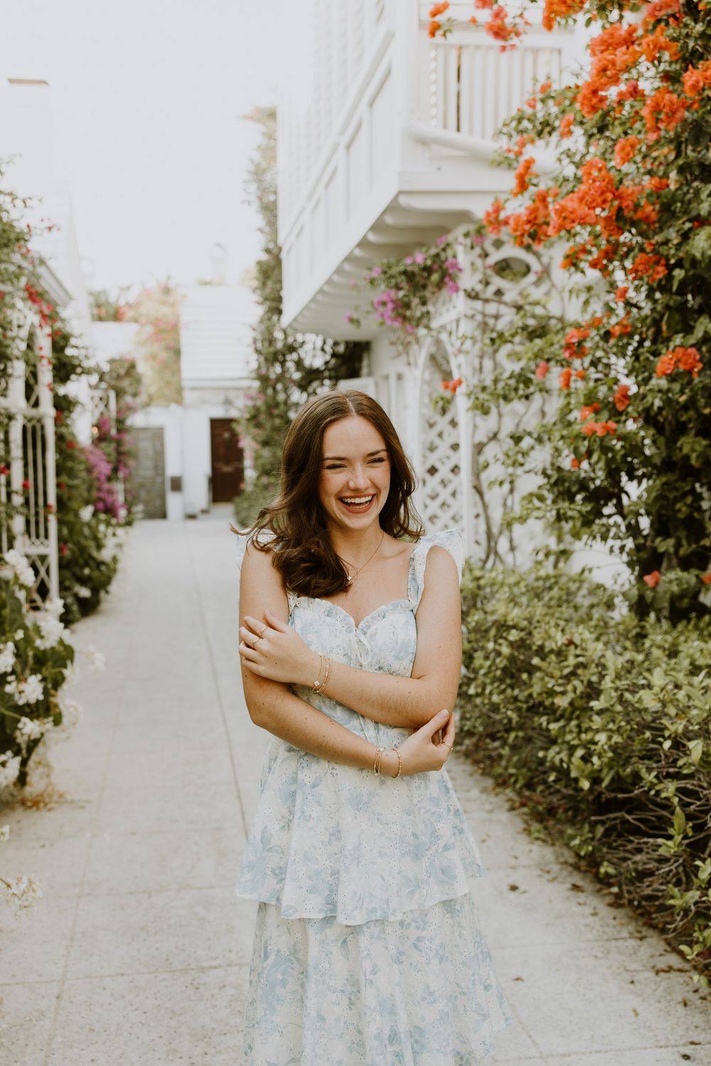 Senior graduation photos on Palm Beach Island off of Major Alley captured by Lindsay McDow Photography