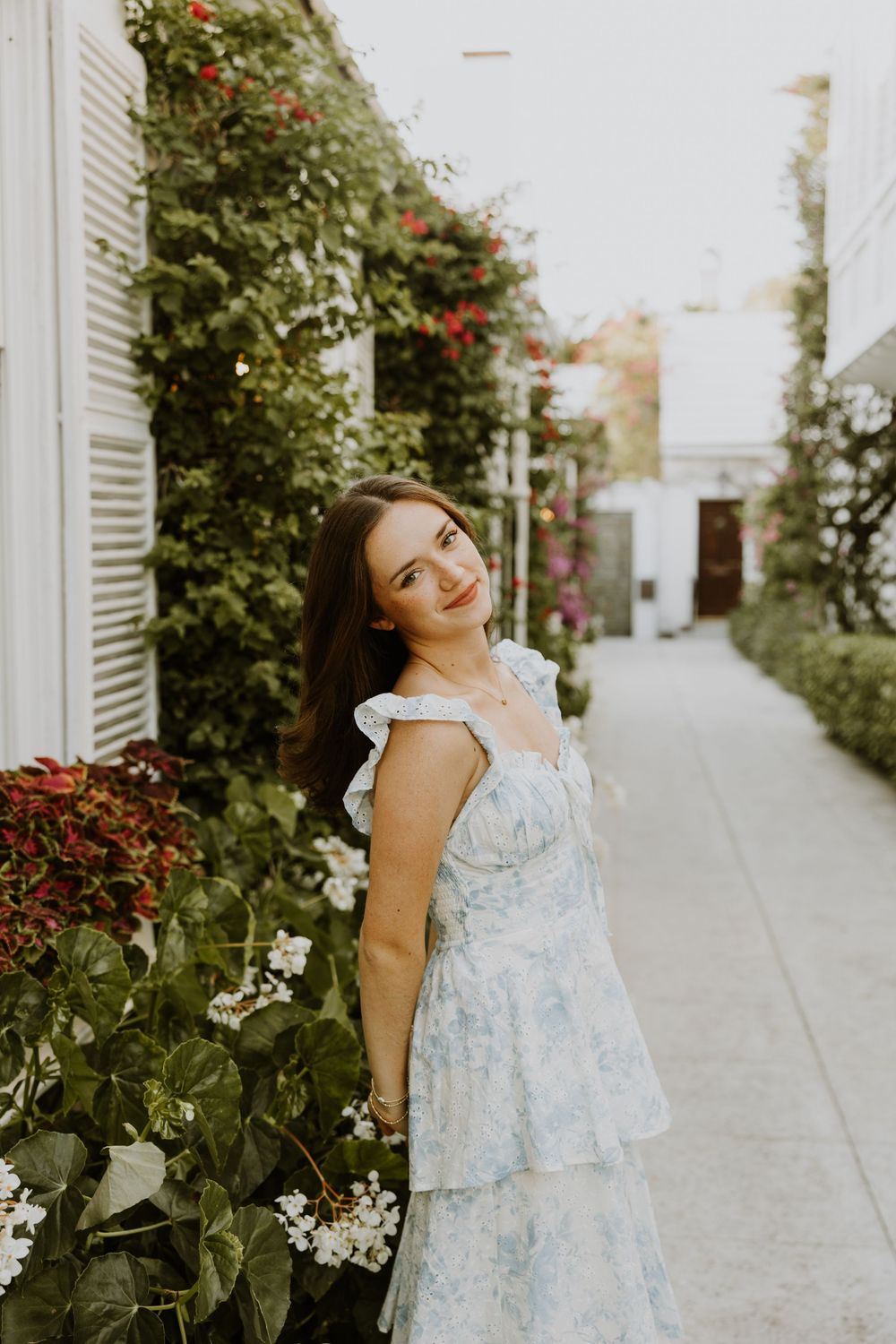 Senior graduation photos on Palm Beach Island off of Major Alley captured by Lindsay McDow Photography
