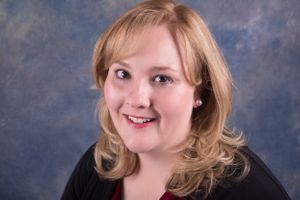 A professional headshot of a nursing friend