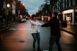 couple spinning in the middle of the street