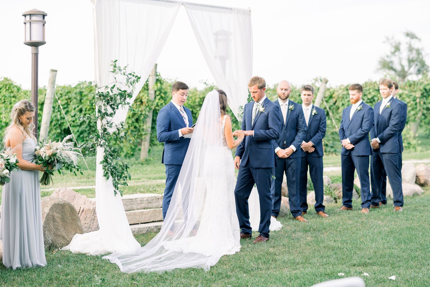 Vineyard photos with white willow events at Prairie Moon Winery wedding in Ames, Iowa