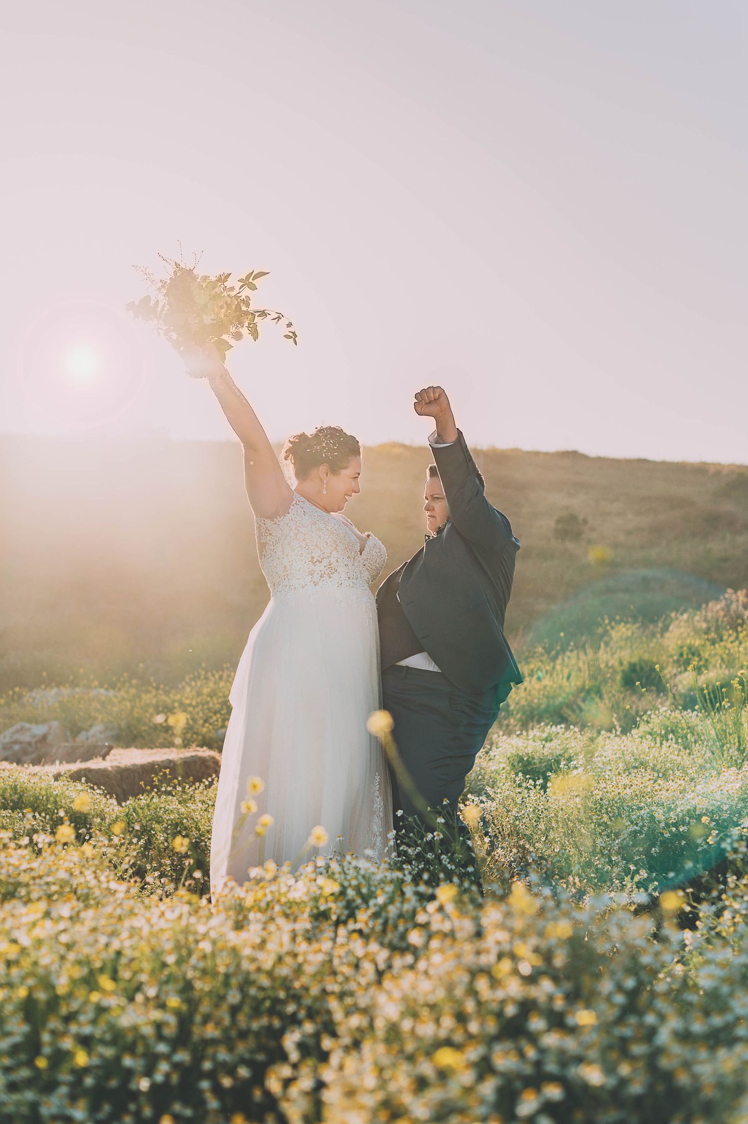 Lesbian brides celebrating that they just tied the knot