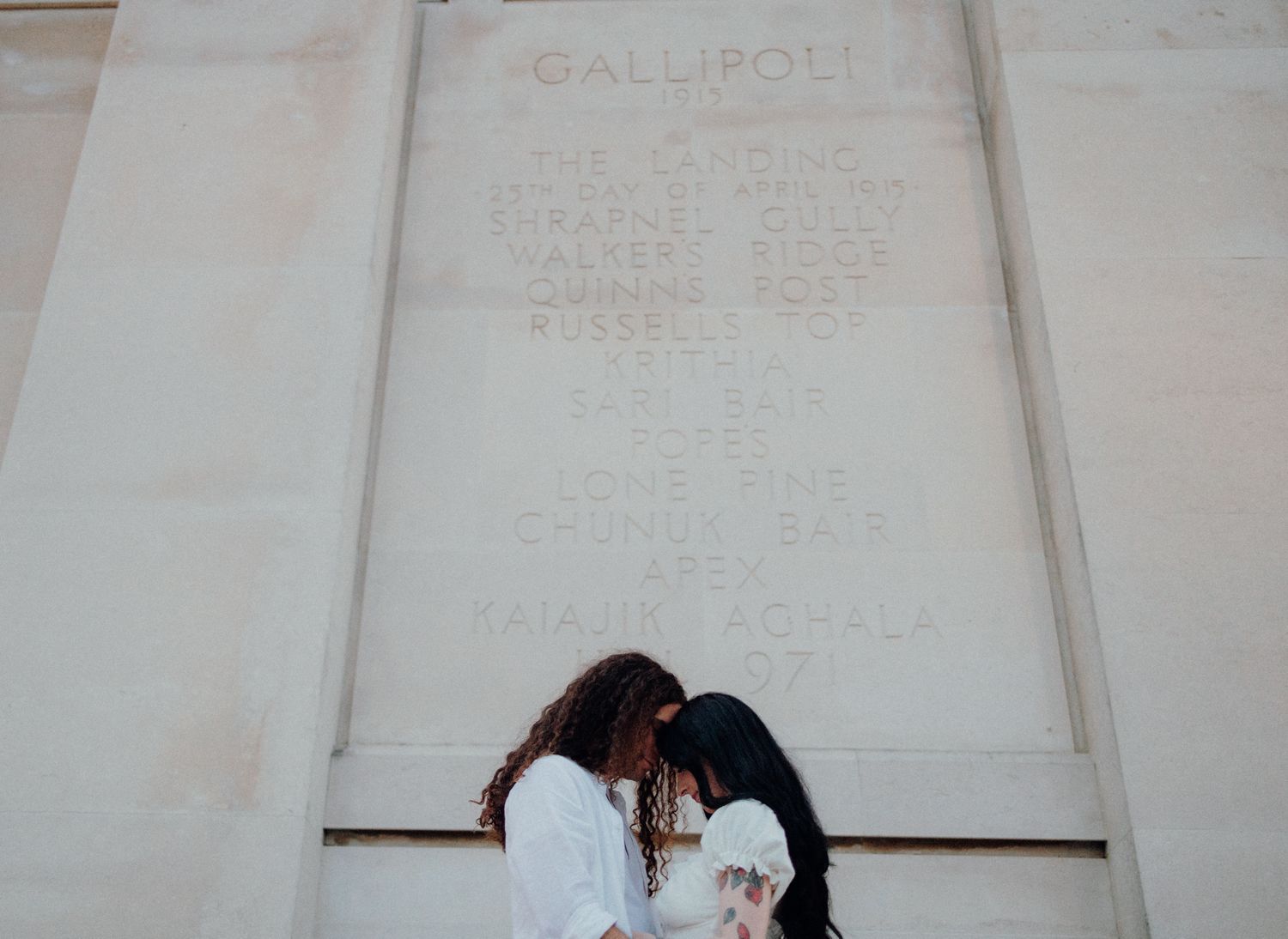 Lovers in Auckland Museum during their engagement shoot with Apertured Media-Auckland Wedding Photographer