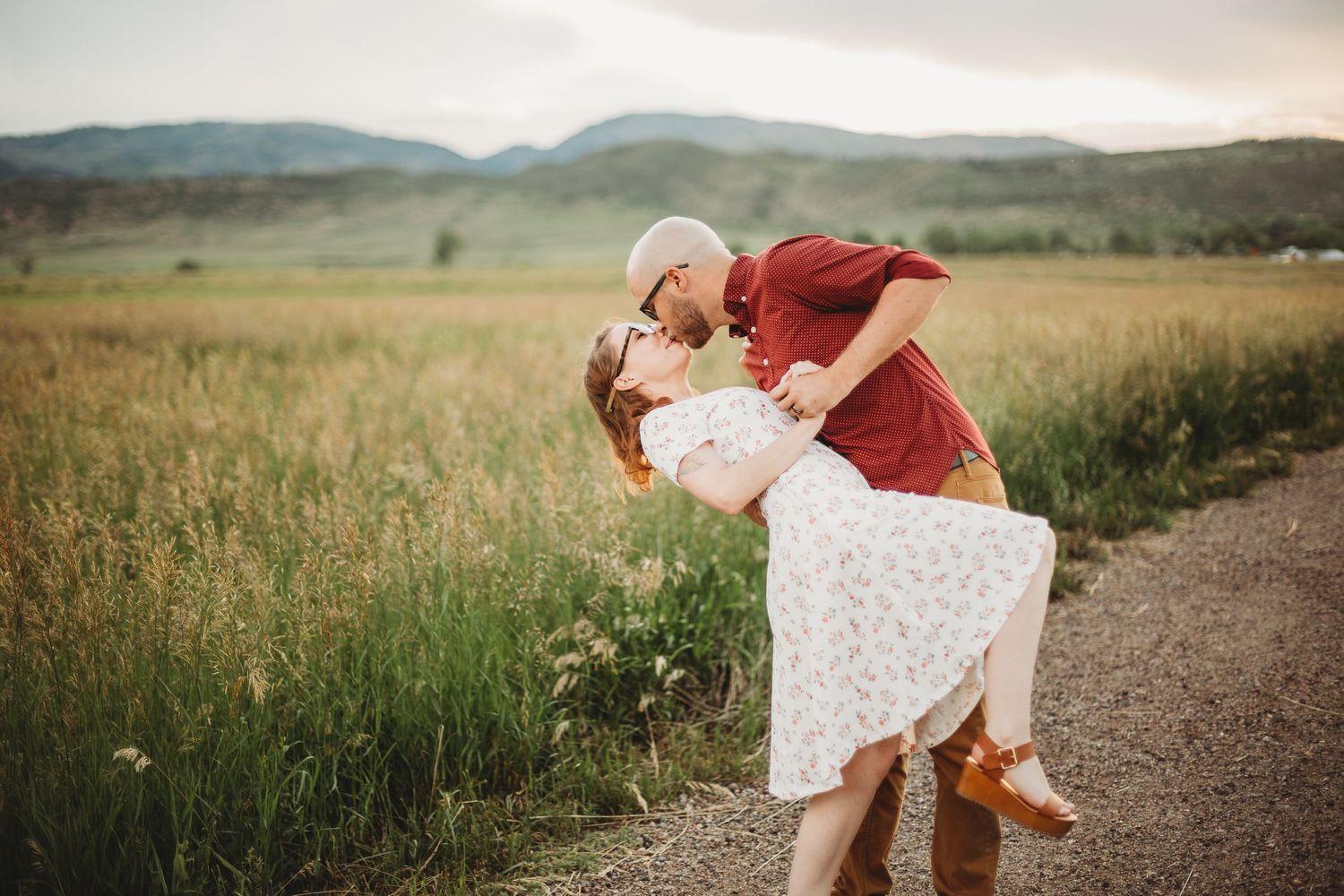 A couple gets their photos taken during their engagement session at Reservoir Ridge Natural Area in Fort Collins.